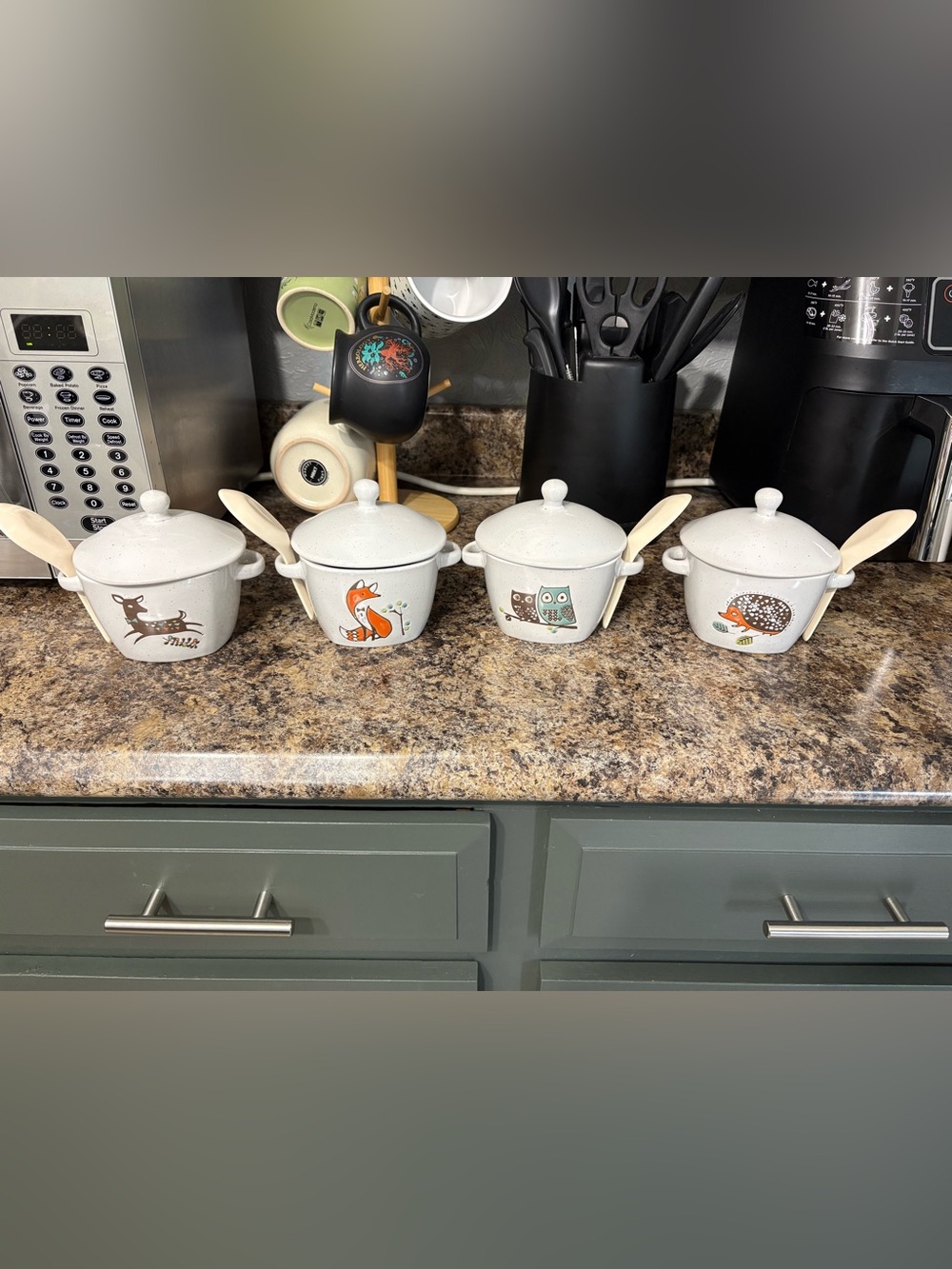 Speckled White Ceramic Bowls with Animal Motifs and Spoons - Set of 4